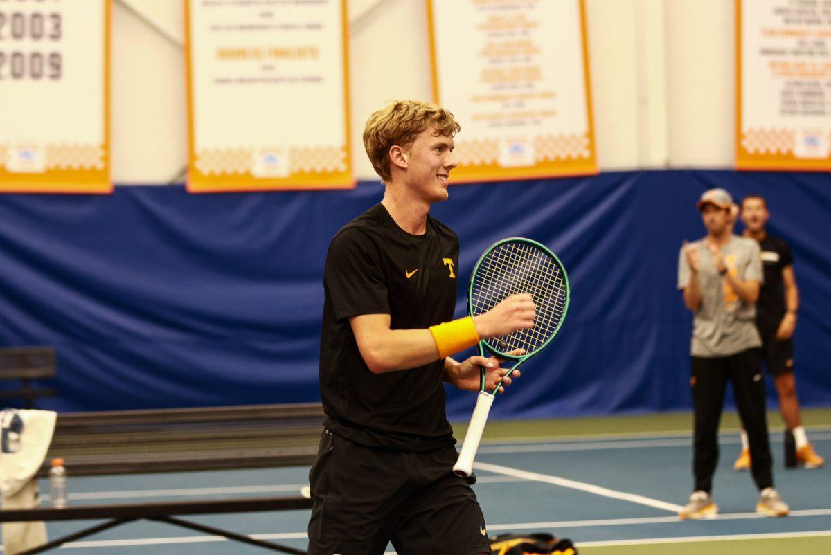 James Newton pumps his fist and smiles after winning a point against Alabama State at Goodfriend Tennis Center. Saturday, May 3, 2025