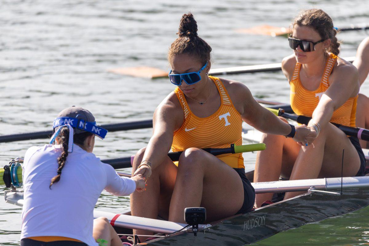  Coxswain Laila Irigoyen praying over her 3V8 boat at the top of the race course at the SEC Championship on Melton Hill Lake. Sunday, May 11, 2025.