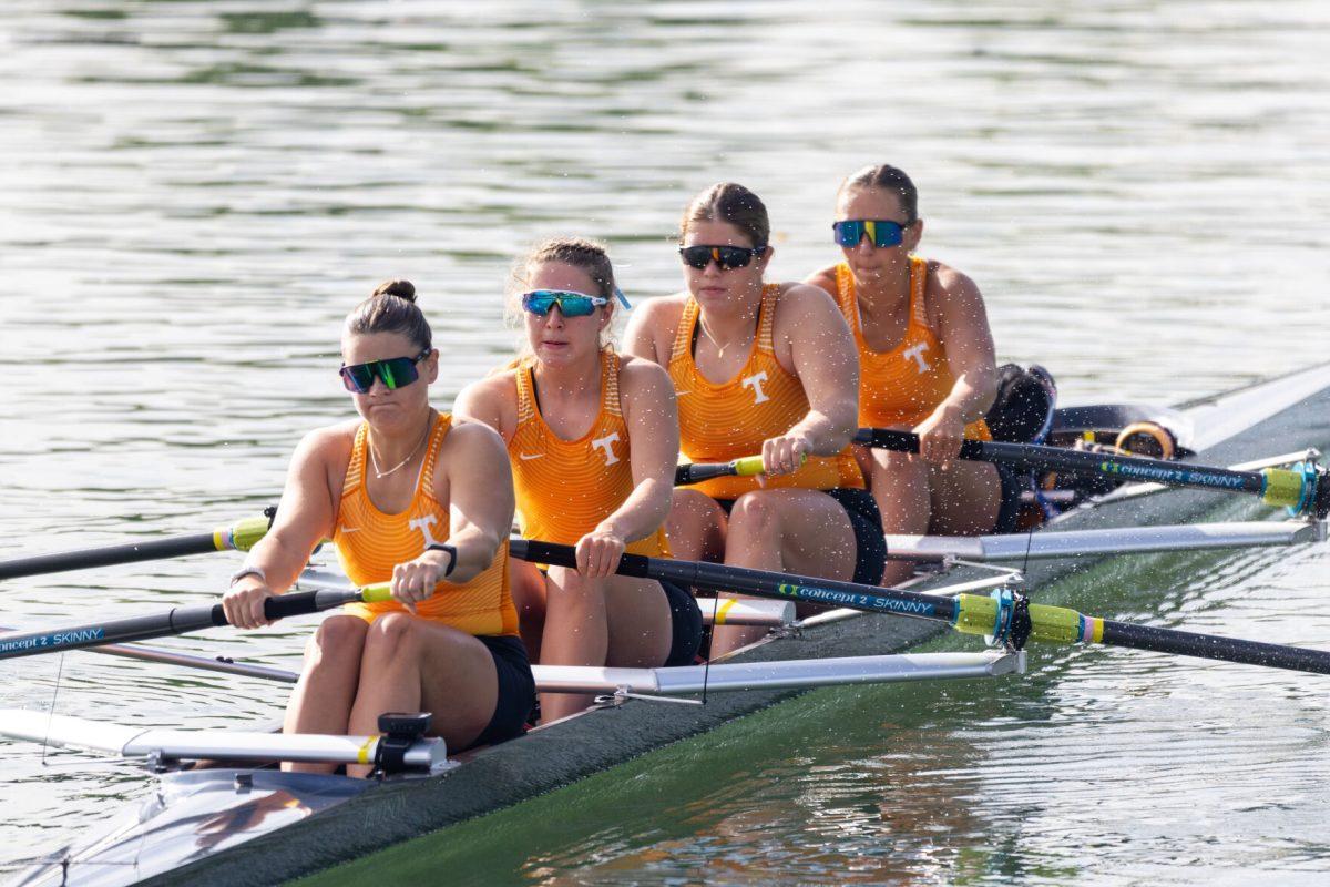 (From left to right) Rowers Cailin Bolt, Kathryn Burton, Bernadette Lombardi, and Maddie Becker drivng into the start of the 3V4 race at the SEC Championship on Melton Hill Lake. Sunday, May 11, 2025.