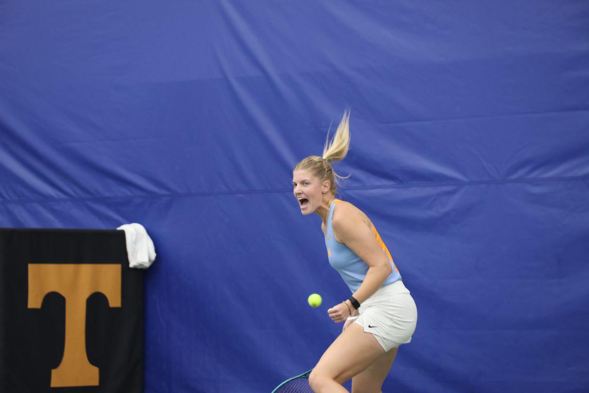 Elza Tomase shouts after winning a point against Auburn at Goodfriend Tennis Center. Sunday, April 6, 2025