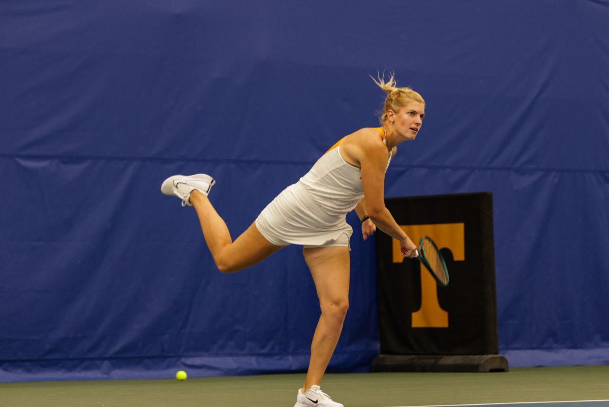 Elza Tomase hits a serve against Elon at Goodfriend Tennis Center. Friday, May 2, 2025