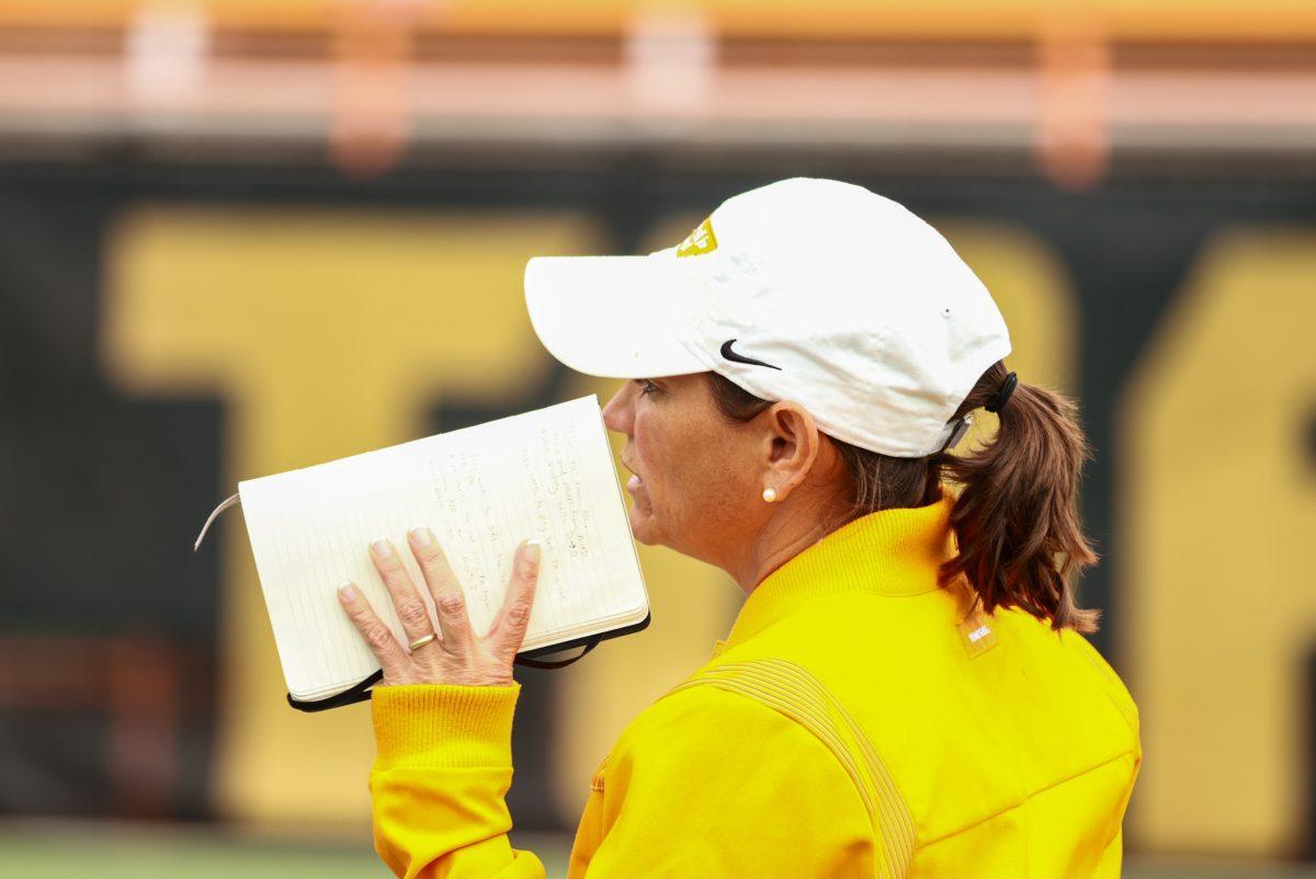 Coach Alison Ojeda talking to players in between points against Pepperdine at Barksdale Stadium. Saturday, May 3, 2025