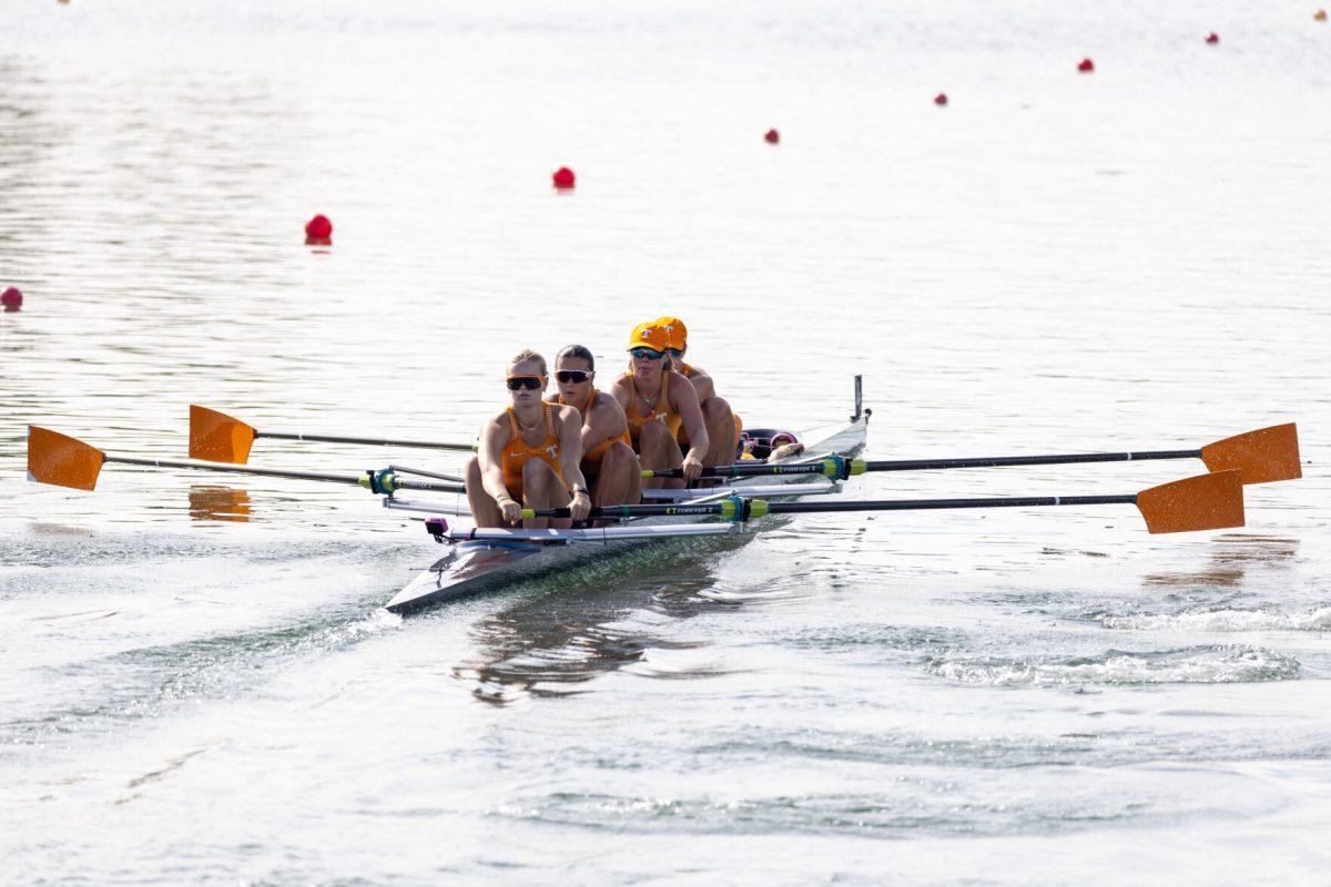 Tennessee’s 2V4 boat heads down the race course with Sydney Harris sitting stern seat at the SEC Championship on Melton Hill Lake. Sunday, May 11, 2025.