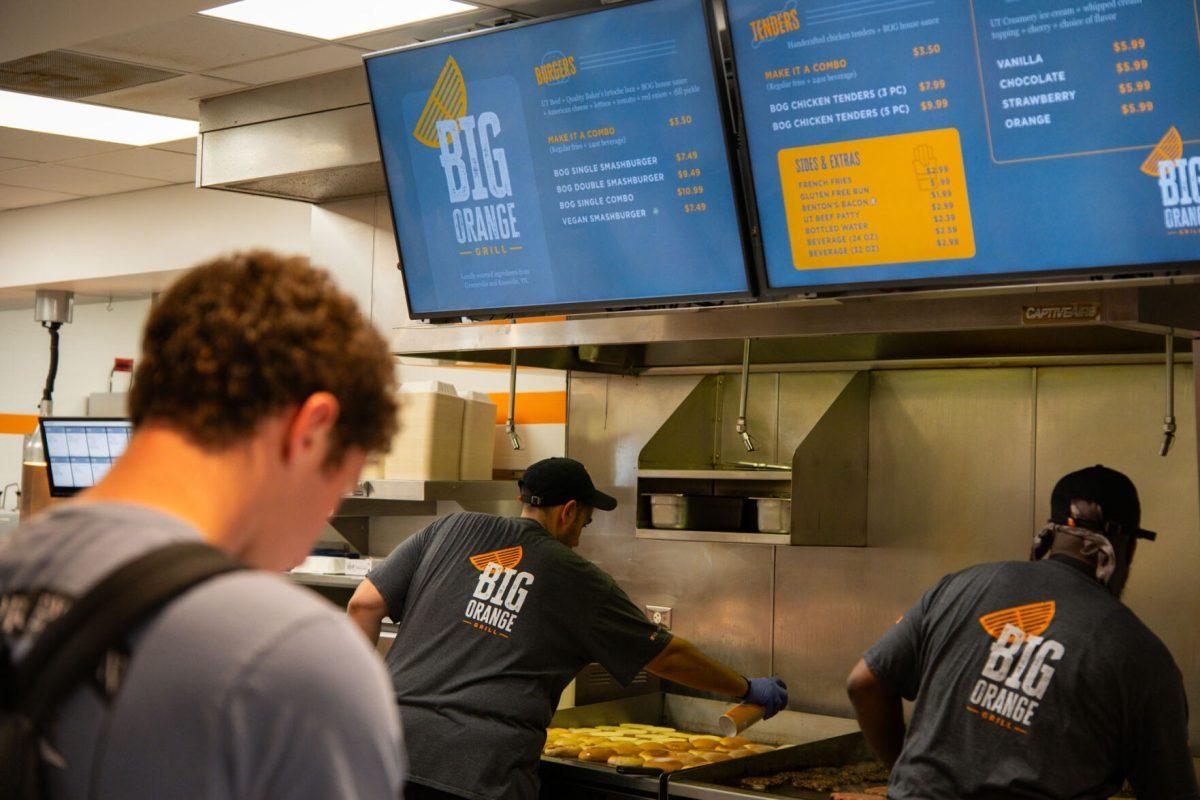 Cooks grill burgers at Big Orange Grill, located in the Student Union, Friday, Aug. 22, 2025.