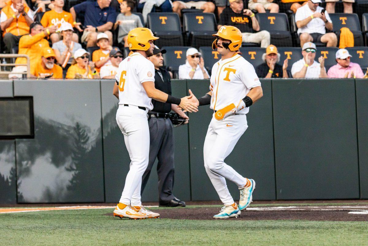 Gavin Kilen (6) and Andrew Fischer (11) celebrate after a home run during the game against Kentucky in Lindsey Nelson Stadium. Friday, April 18, 2025.