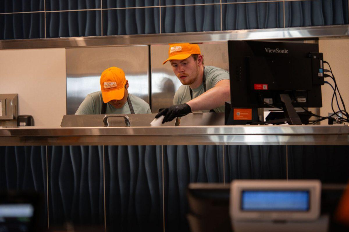 Restaurant staff prepare orders at the new Hillside Cafe restaurant, located in the Nursing Building, Friday, Aug. 22, 2025.