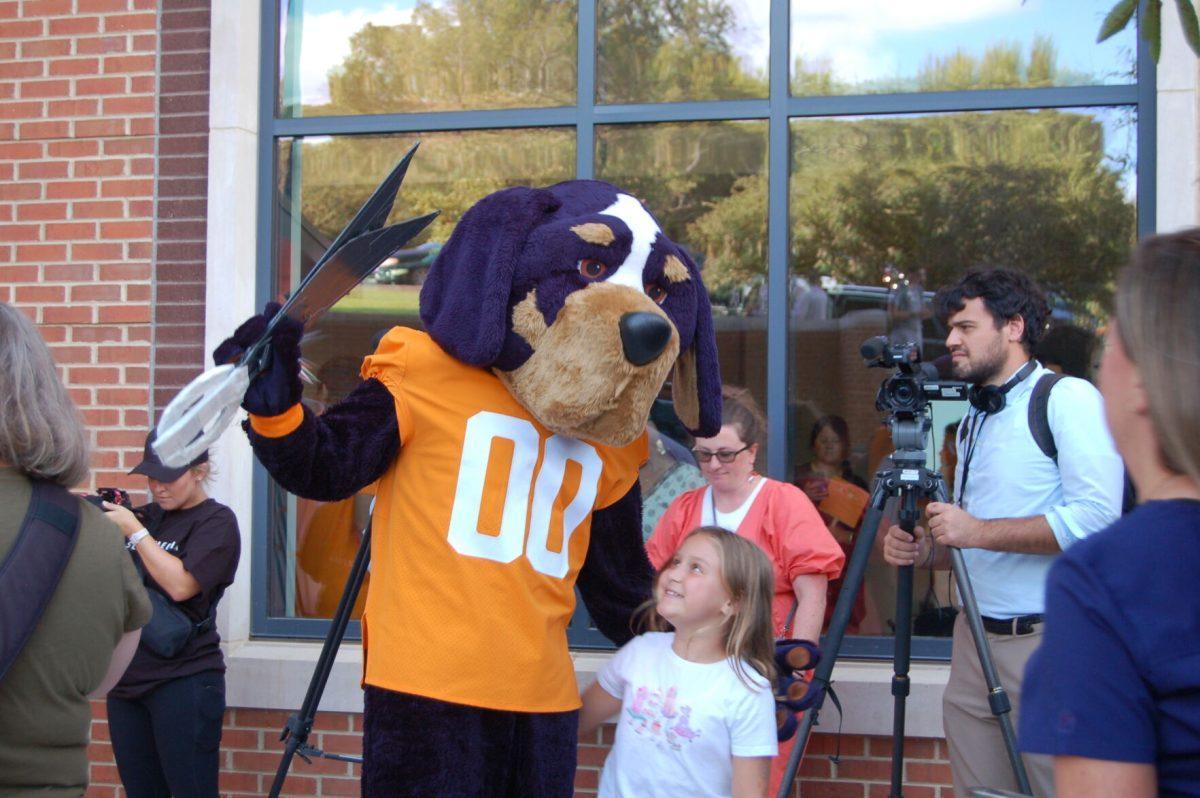 Smokey smiles with a young Vol in preparation for the dedication of the UT Medical Nursing Building.
 