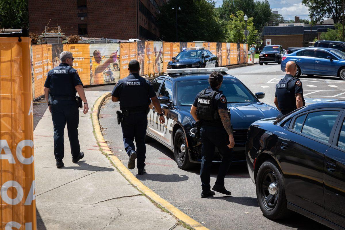 UT Police gather outside Hodges Library on Aug. 25.