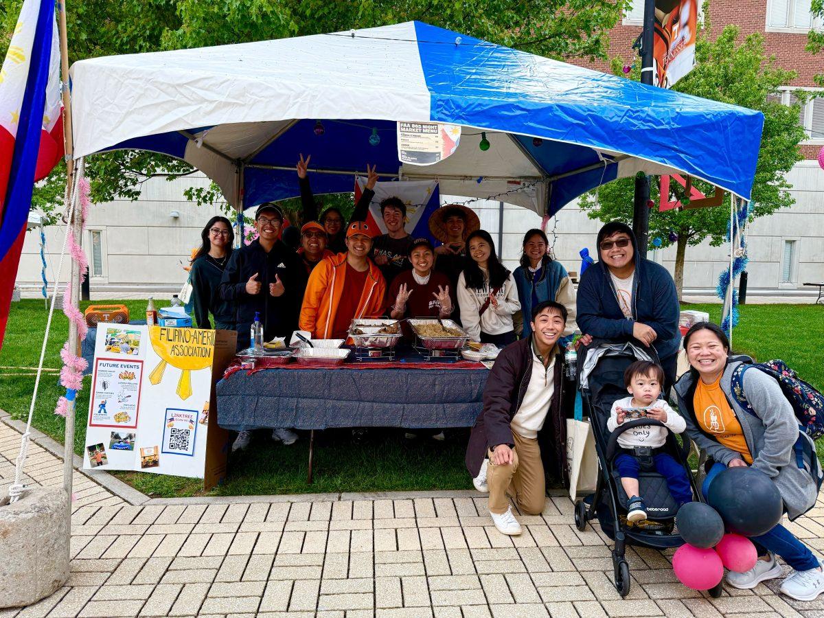 The Filipino American Association poses for a photo after a successful night serving food at the 865 Night Market. Wednesday, Sept. 10, 2025.
