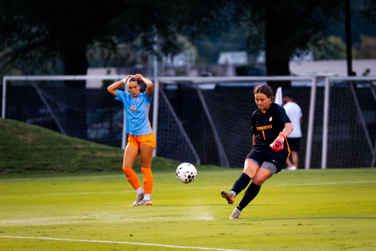 Cayden Norris (1) sends a goal kick while defender Leah Klurman (21) looks on, Sept. 26, 2025