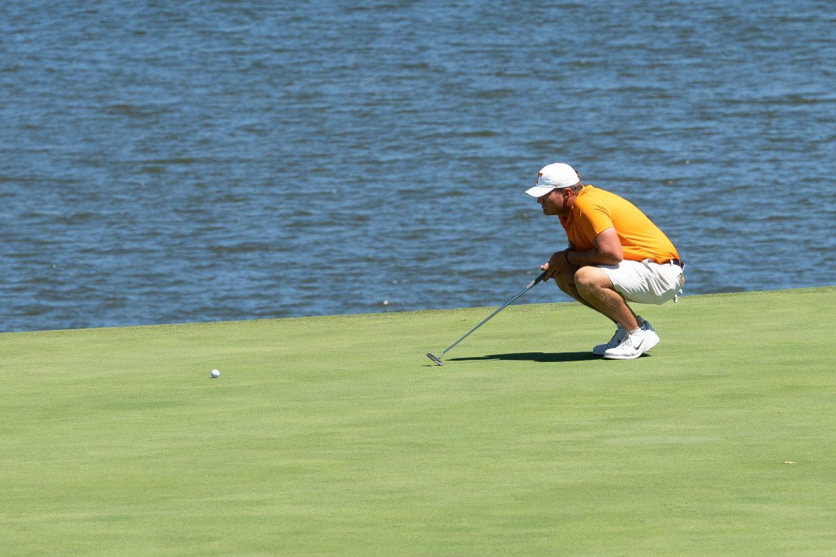 Jackson Herrington lines up his put during the Visit Knoxvile Collegiate in Loudon, TN. Sunday, Sept. 7, 2025.