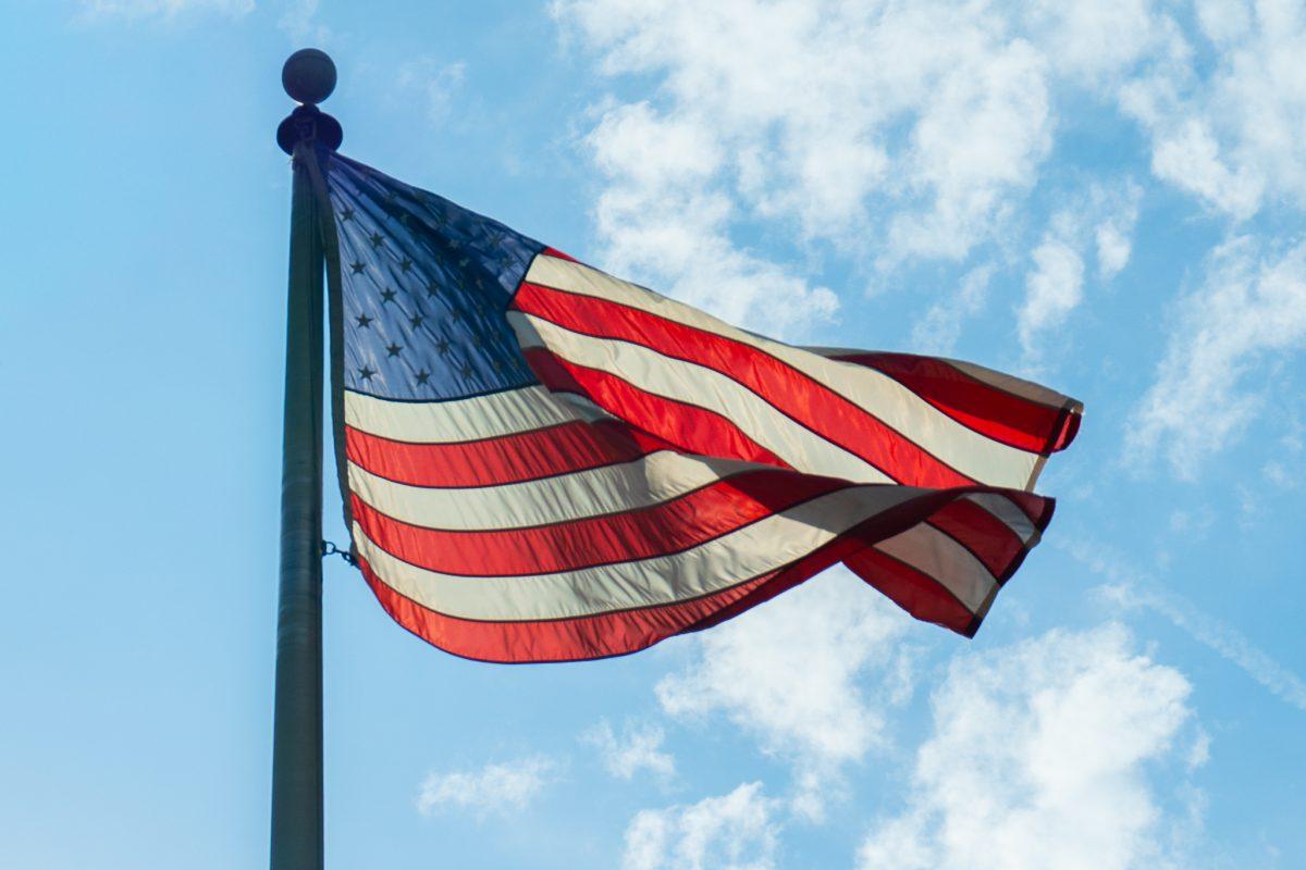 American flag blowing in the wind outside of the College of Communication and Information. Wednesday, Sept. 16, 2025. 