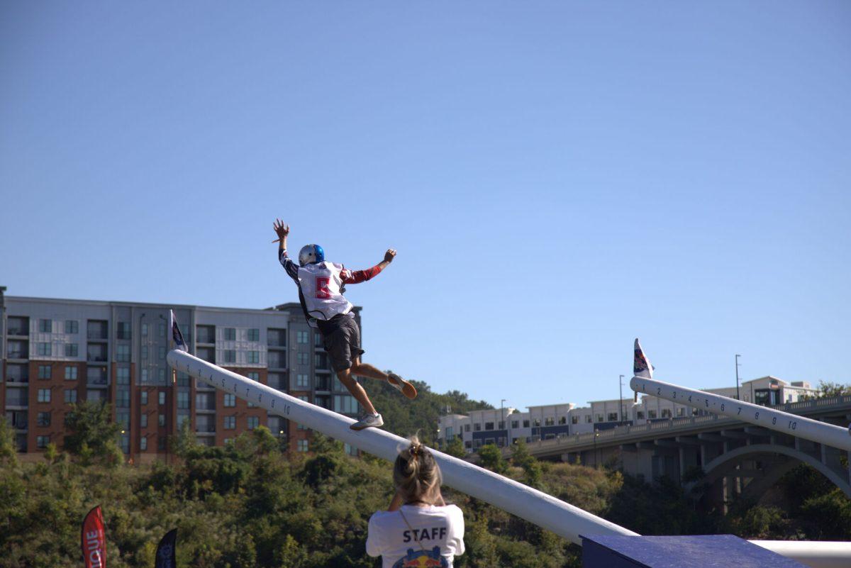 A competitor runs up the goalposts on Sept. 12, 2025.