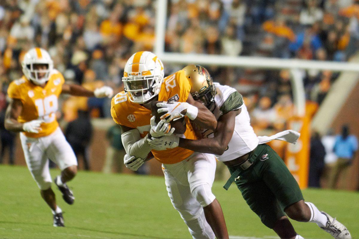Bryce Thompson, #20, attempts to dodge an opposing player at the UAB football game at Neyland Stadium on Saturday, November 2, 2019.