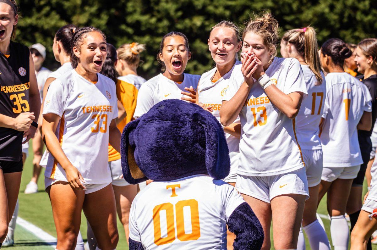 Lady Vols soccer players cheer as Smokey pretends to propose to Keaton Mitchell (13) after a win over Georgia Southern in Regal Soccer Stadium. Sunday, Sept. 7, 2025.