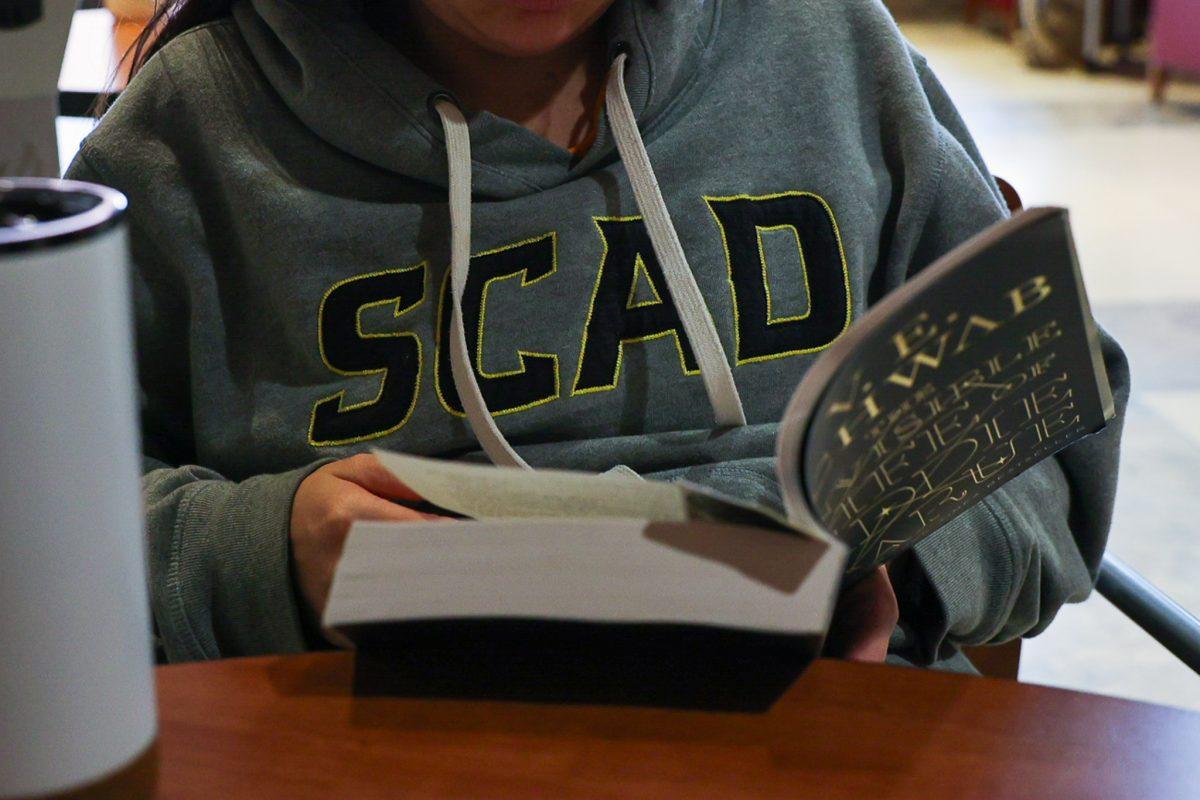 Graduate student Sophia Fish reads at a study nook Hodges Library. Thursday, Sept. 4, 2025.