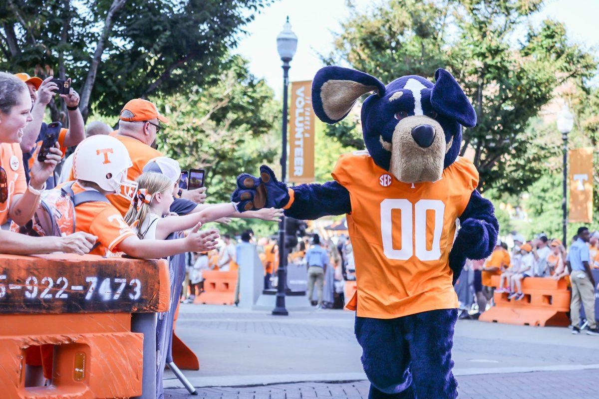 Mascot Smokey runs to Neyland Stadium during the Vol Walk before the UAB football game on Saturday, Sept. 20, 2025.