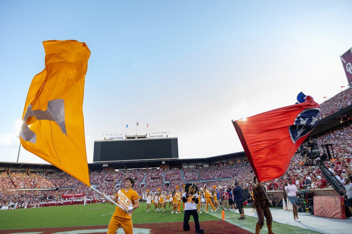 Tennessee flags are waved before a game against Oklahoma at Gaylord Family - Oklahoma Memorial Stadium in Norman. Saturday, Sept. 21, 2024.