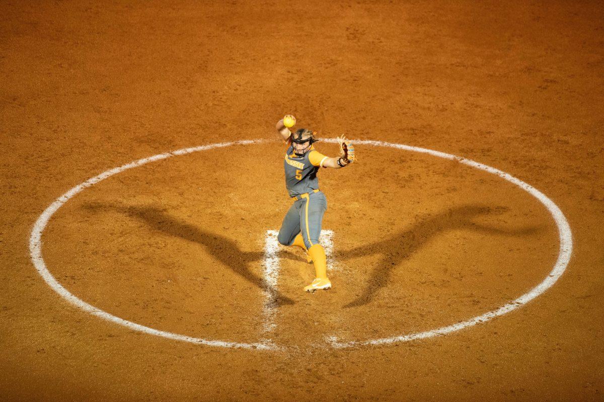 Maddi Rutan (5) fires a pitch against Lee during a fall ball scrimmage at Sherri Parker Lee Stadium. Friday, Oct. 10, 2025. 