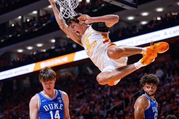 Cade Phillips (12) dunks over the Duke defense during an exhibition game at Food City Center, Sunday Oct. 26, 2025.