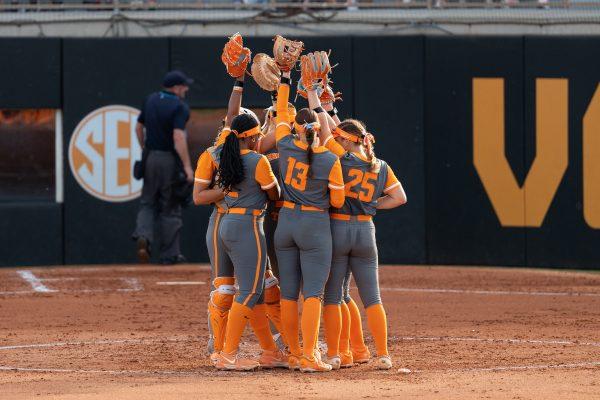 The Lady Vols infield gather before the start of an inning against ETSU at Sherri Parker Lee Stadium. Saturday, Oct. 4, 2025.