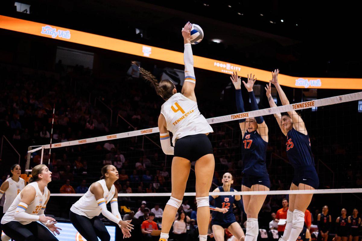 Paityn Chapman (4) goes for the kill during the game against Auburn in Thompson-Boling Arena at Food City Center. Sunday, Oct. 19, 2025.