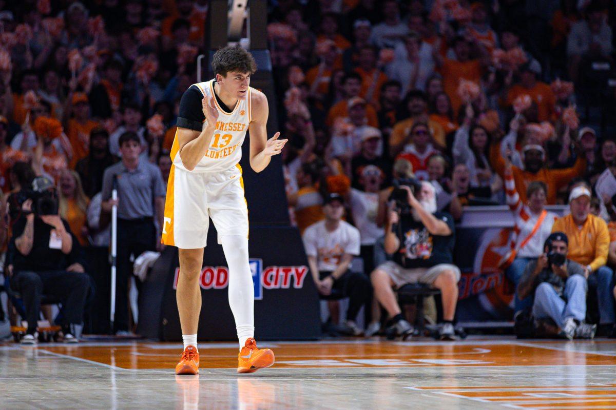 J.P. Estrella (13) celebrates a three-pointer during an exhibition game against Duke at Food City Center, Sunday Oct. 26, 2025.