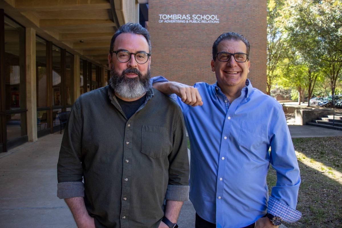 Professors David Norman and Dustin Thomas outside of the CCI Building. Courtesy of David Norman.