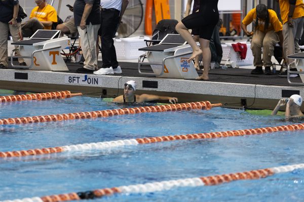 McKenzie Siroky looks up at the scoreboard at the end of her heat in the the woman's 200 meter breaststroke during the Tennessee invitational at the Allan Jones Intercollegiate Aquatic Center. Friday, Nov. 22, 2024.