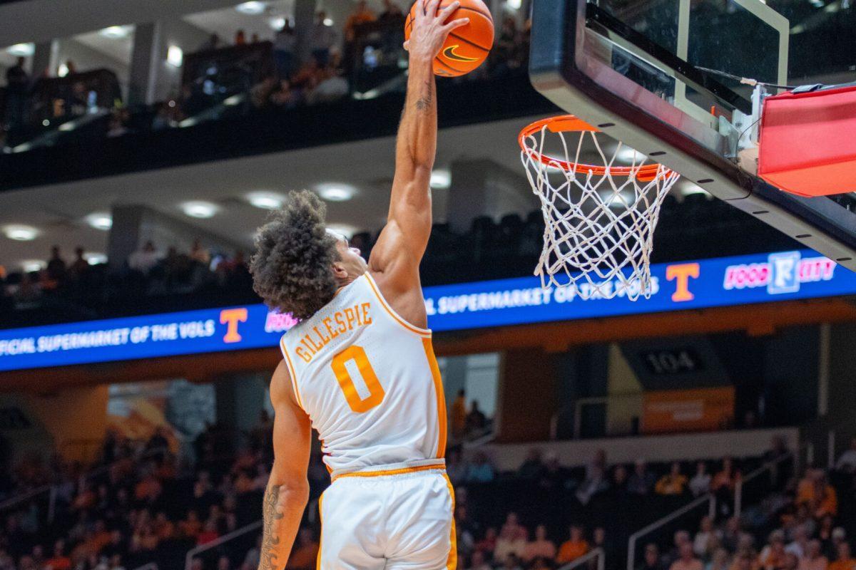 Ja'Kobi Gillespie (0) dunks the ball during a game against North Florida at Food City Center. Wednesday, Nov. 12, 2025.