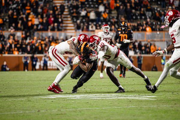 DeSean Bishop (18) gets tackled during a game against Oklahoma at Neyland Stadium. Saturday, Nov. 1, 2025.