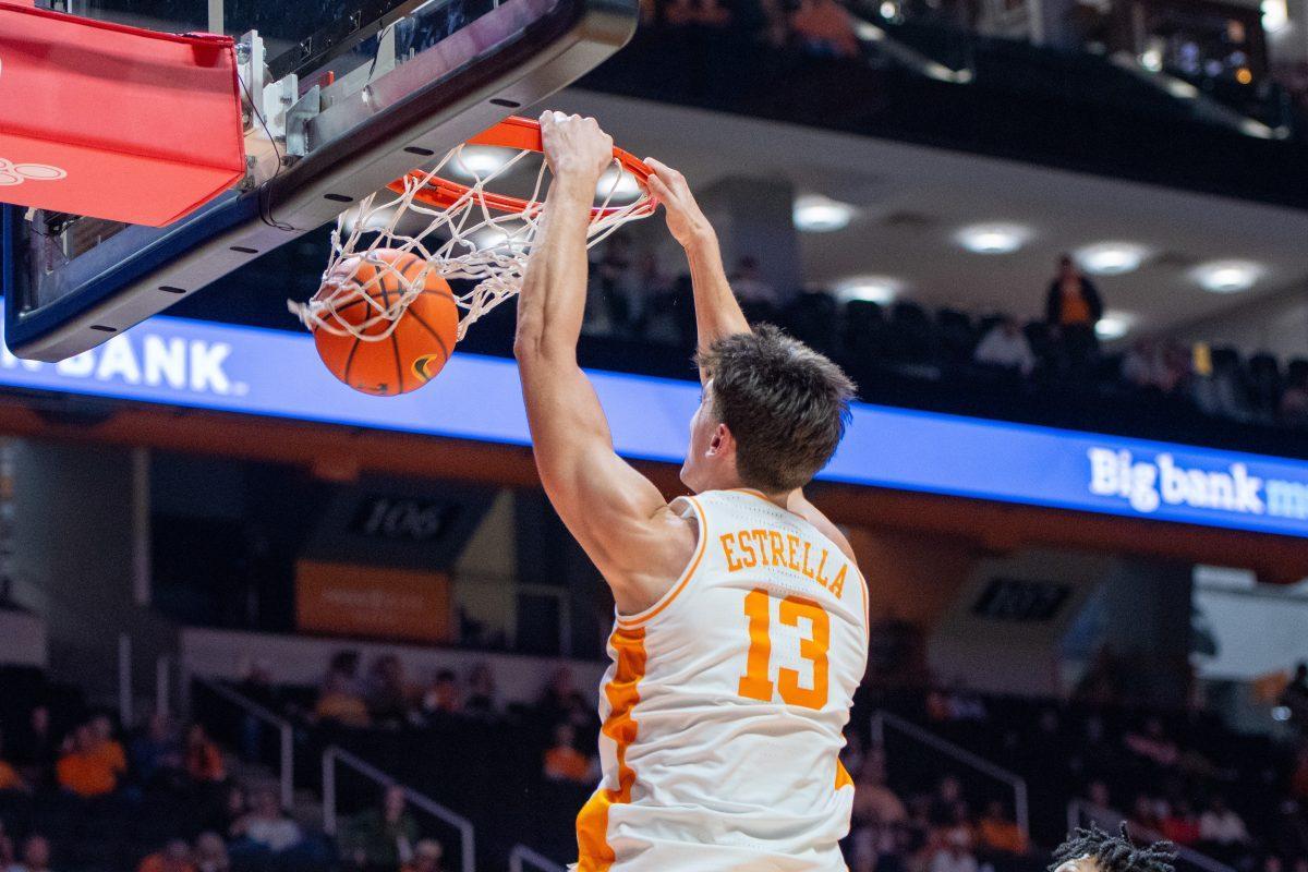 J.P. Estrella (13) dunks the ball during a game against North Florida at Food City Center. Wednesday, Nov. 12, 2025.