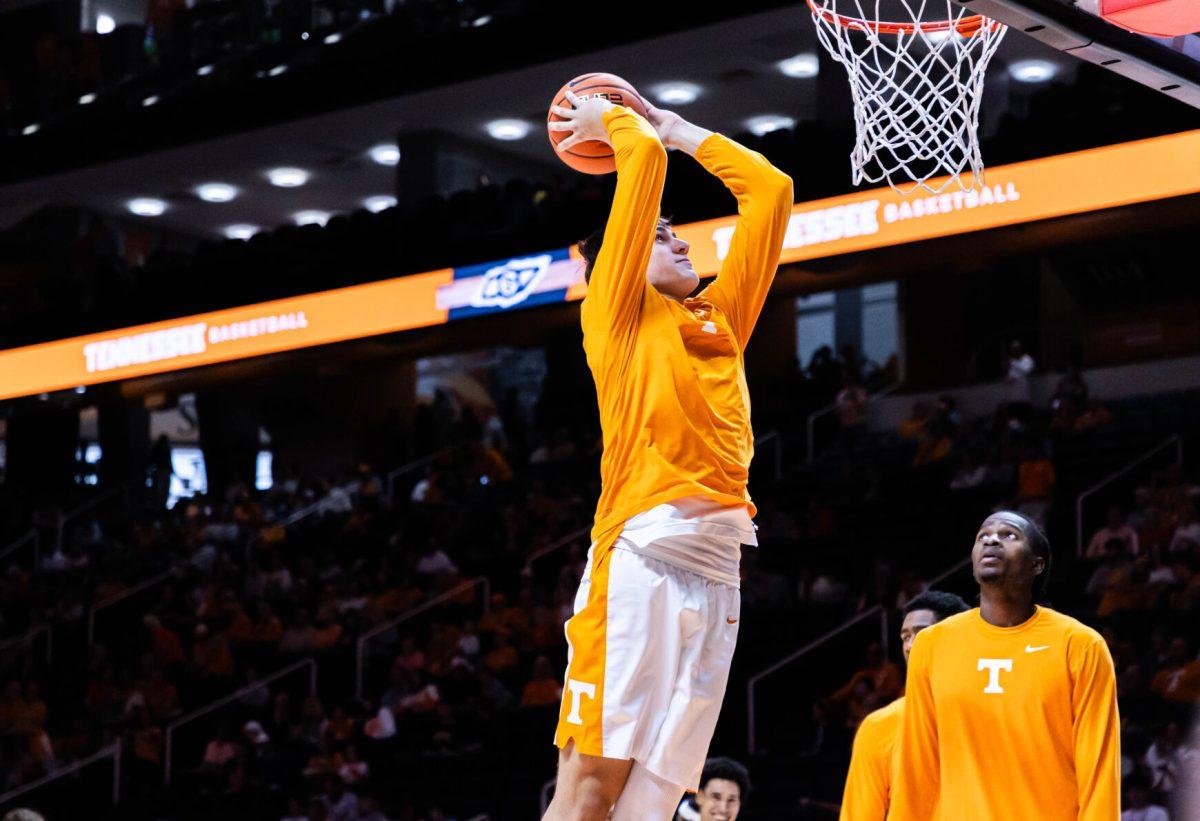 JP Estrella (13) warms up for the game against Northern Kentucky in Thompson-Boling Arena at Food City Center. Saturday, Nov. 8, 2025.