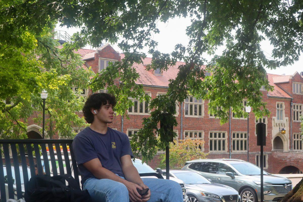 Student listening to music on campus. Monday, Nov. 10, 2025. 