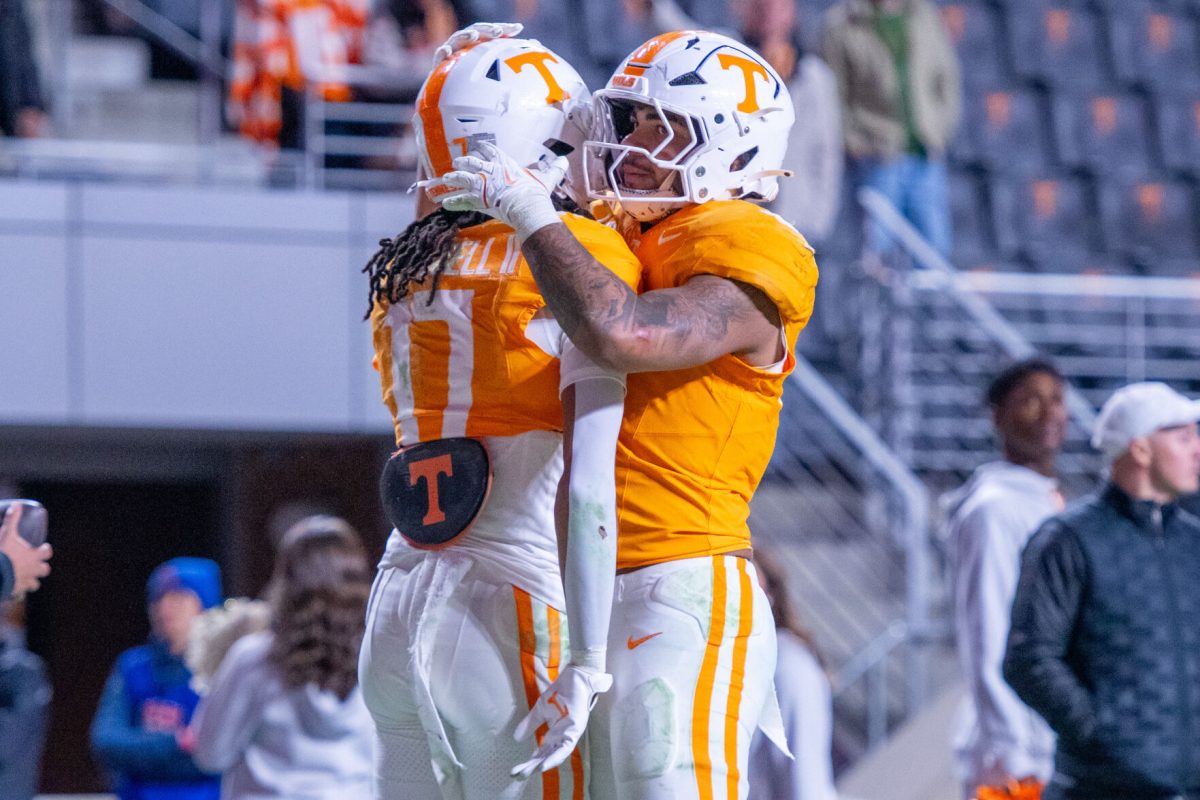 Ethan Davis (0) hugs Chris Brazzell II (17) as Tennessee football loses to Vanderbilt at Neyland Stadium. Saturday, Nov. 29, 2025.