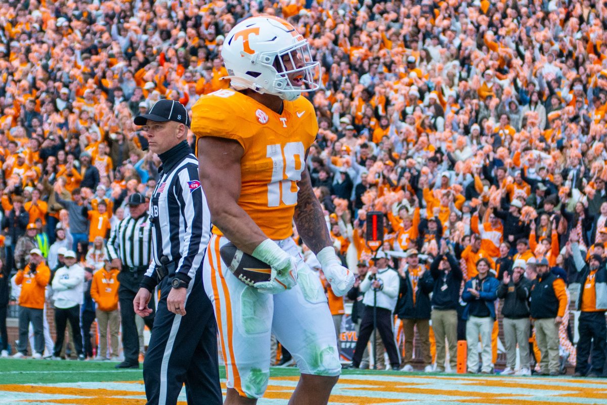 DeSean Bishop (18) scores a touchdown during a game against Vanderbilt at Neyland Stadium. Saturday, Nov. 29, 2025.