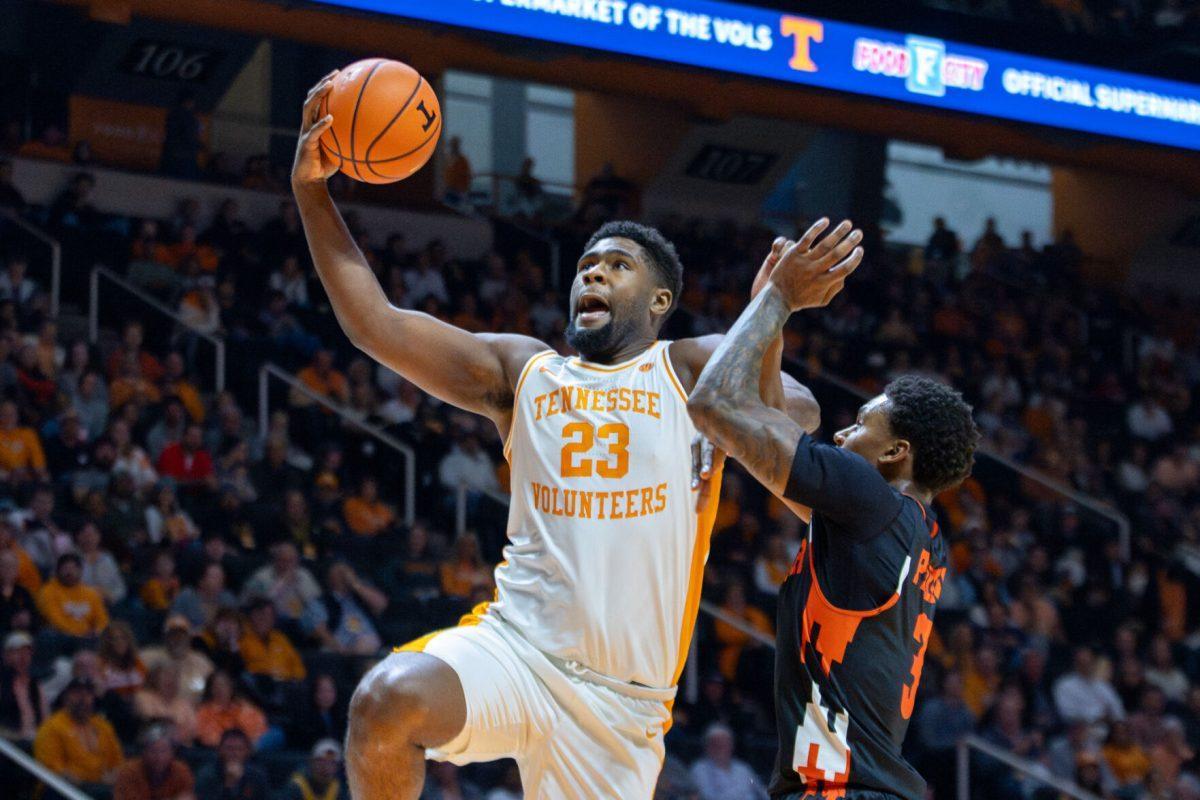 Jaylen Carey (23) drives to the basket during a game against Mercer at Food City Center. Monday, Nov. 3, 2025.