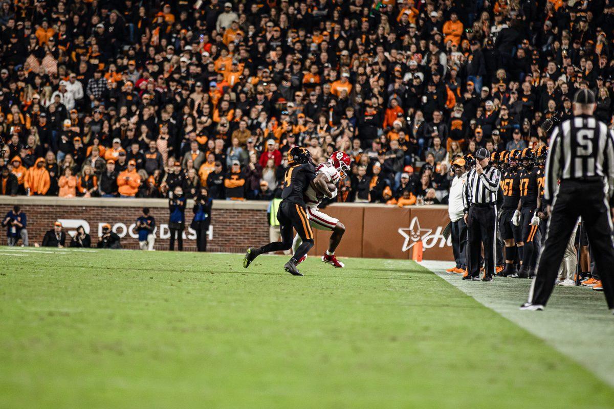 Ty Redmond (4) tackles his opponent during a game against Oklahoma at Neyland Stadium. Saturday, Nov. 1, 2025.