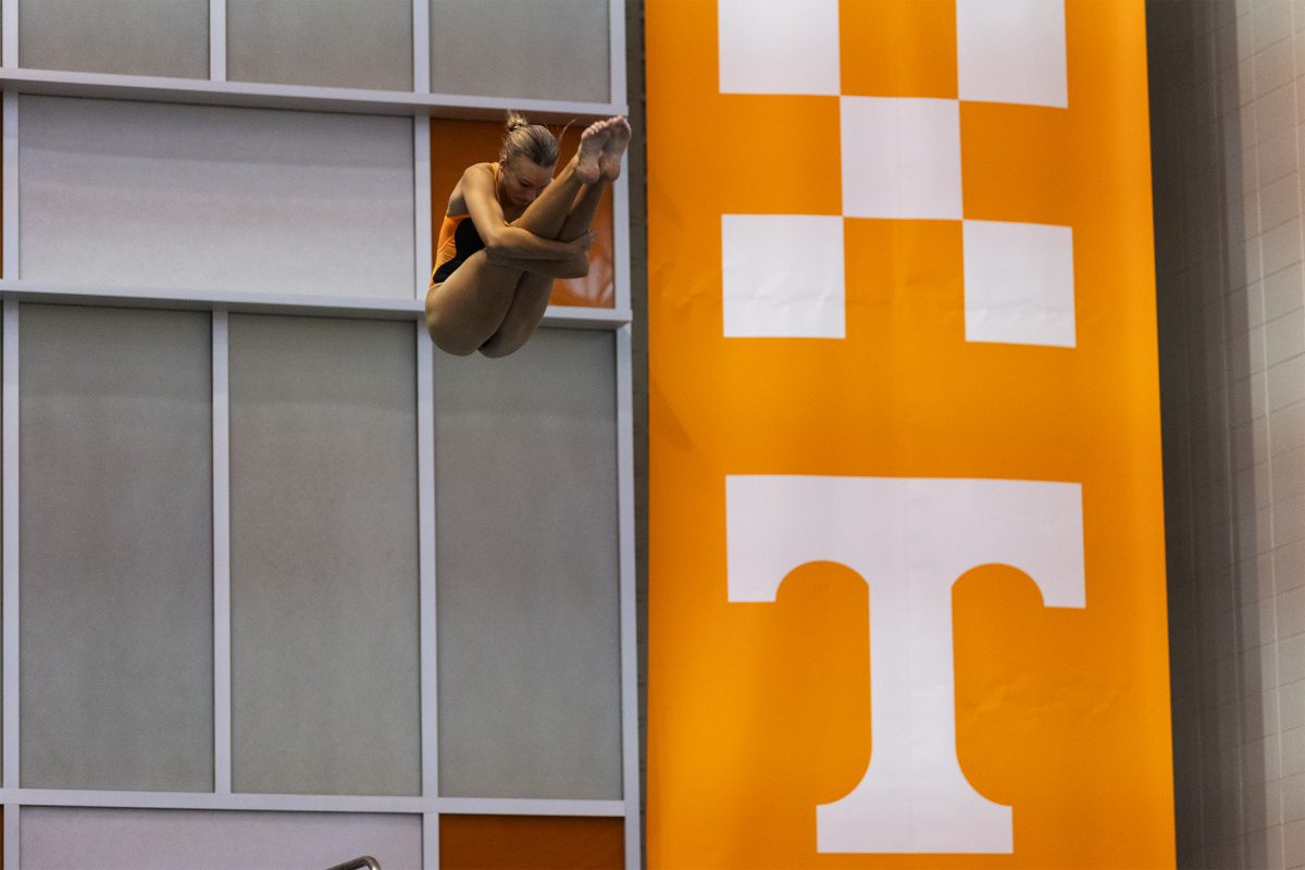 Lynae Shorter performs a dive off the three-metrer platform at the Allan Jones Intercollegiate Aquatic Center during the Tennessee Invite. Thursday, Nov. 21, 2024.