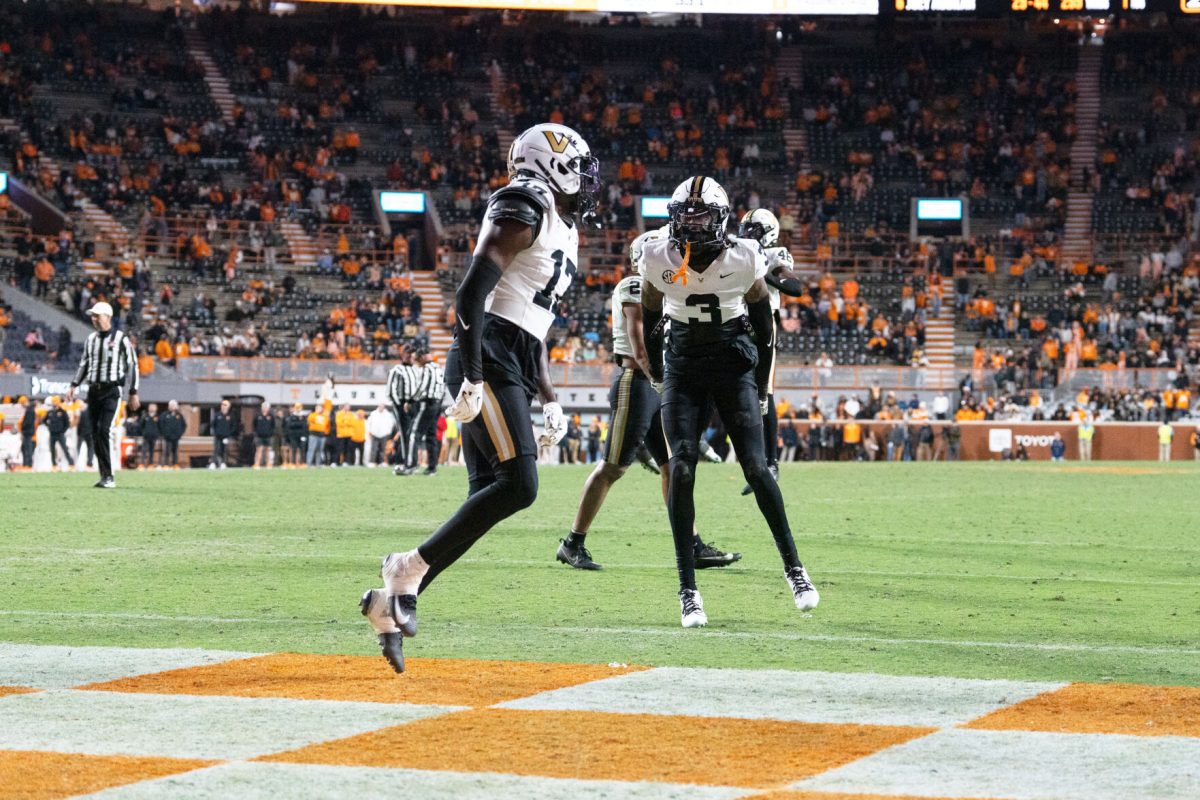 A couple of Vanderbilt players celebrate after the Commodores beat the Vols at Neyland Stadium. Saturday, Nov. 29, 2025.