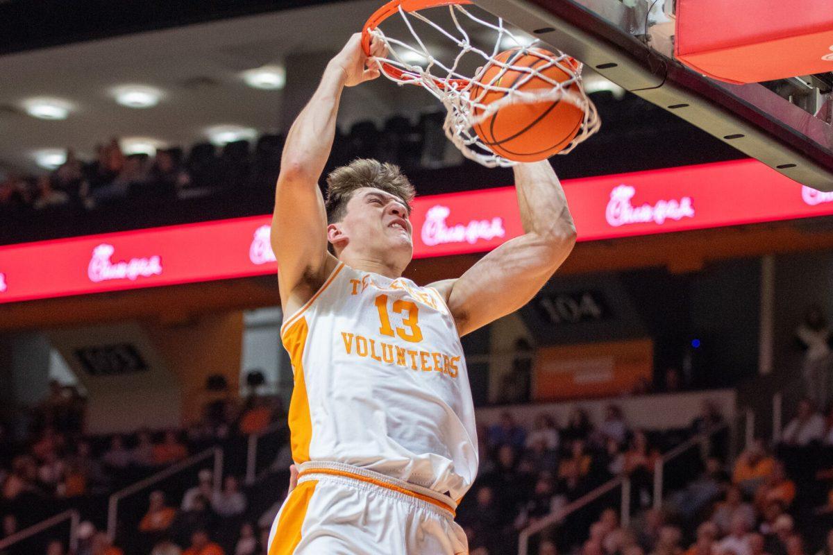 J.P. Estrella (13) dunks the ball during a game against North Florida at Food City Center. Wednesday, Nov. 12, 2025.