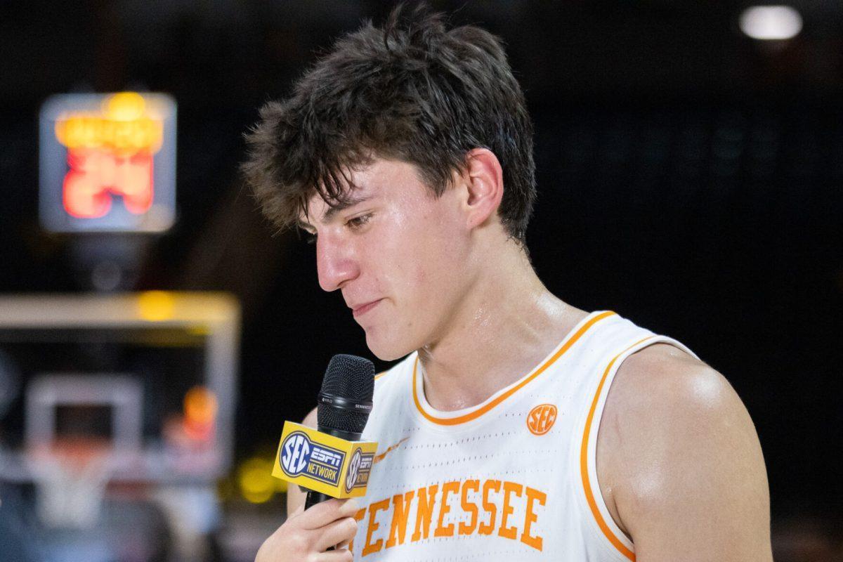 JP Estrella (13) talks to media after a win over Mercer at Food City Center. Monday, Nov. 3, 2025.