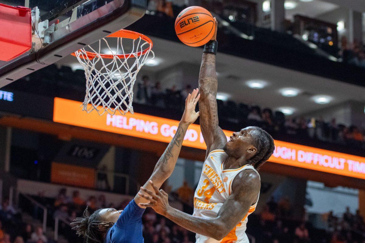 Felix Okpara (34) dunks the ball during a game against North Florida at Food City Center. Wednesday, Nov. 12, 2025.