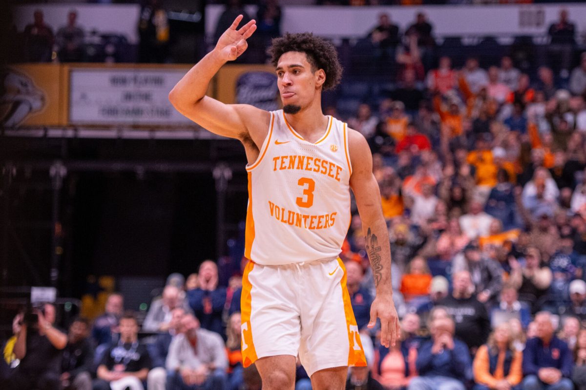 Bishop Boswell (3) celebrates a three during a game against Illinois at Bridgestone Arena. Saturday, Dec. 6, 2025.