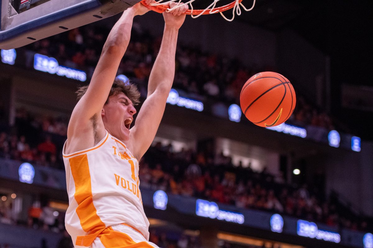J.P. Estrella (13) dunks the ball during a game against Illinois at Bridgestone Arena. Saturday, Dec. 6, 2025.
