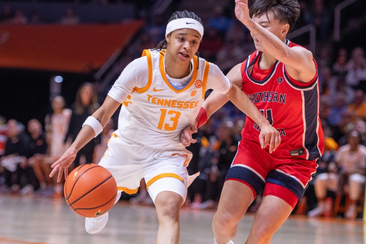 Mia Pauldo (13) drives to the rim agaisnt Southern Indiana at Food City Center. Monday, Dec. 22, 2025.