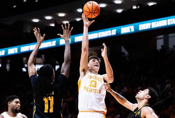 JP Estrella (13) attempts a shot during the game against Northern Kentucky in Thompson-Boling Arena at Food City Center. Saturday, Nov. 8, 2025.