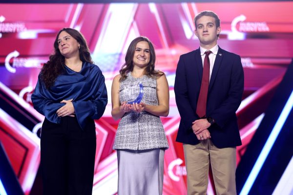 Left to right: Kaylee Blanton, Emma Arns and Nick Suttle represent UT’s Turning Point USA chapter at the 2025 AmericaFest conference.