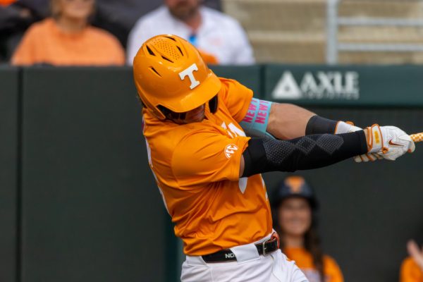 Chris Newstrom (26) swings at a pitch in a game against Kent State at Lindsey Nelson Stadium. Saturday, Feb. 21 2026.