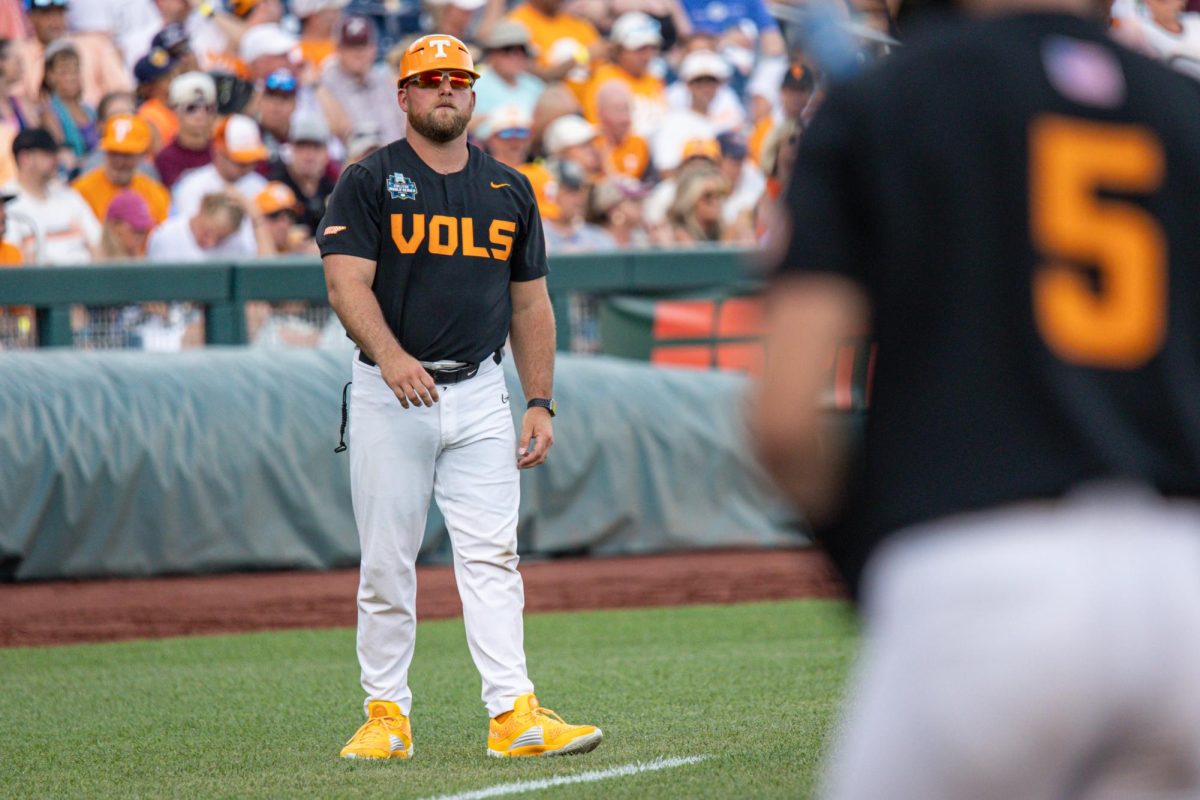 Assistant coach Josh Elander during a College World Series game against Texas A&M at Charles Schwab Field. Monday, June 24, 2024.